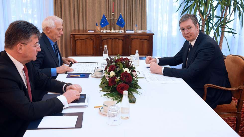 epa10530472 EU High Representative for Foreign Affairs and Security Policy Josep Borrell (C) and EU Special Representative Miroslav Lajcak (L) meet with Serbian President Aleksandar Vucic (R), during the High-level Meeting of the Belgrade-Pristina Dialogue in Ohrid, Republic of North Macedonia, 18 March 2023. International diplomats are trying to make progress with the so-called 'French - German' plan in an effort to normalize the ties between Kosovo and Serbia.  EPA/DIMITRIJE GOLL