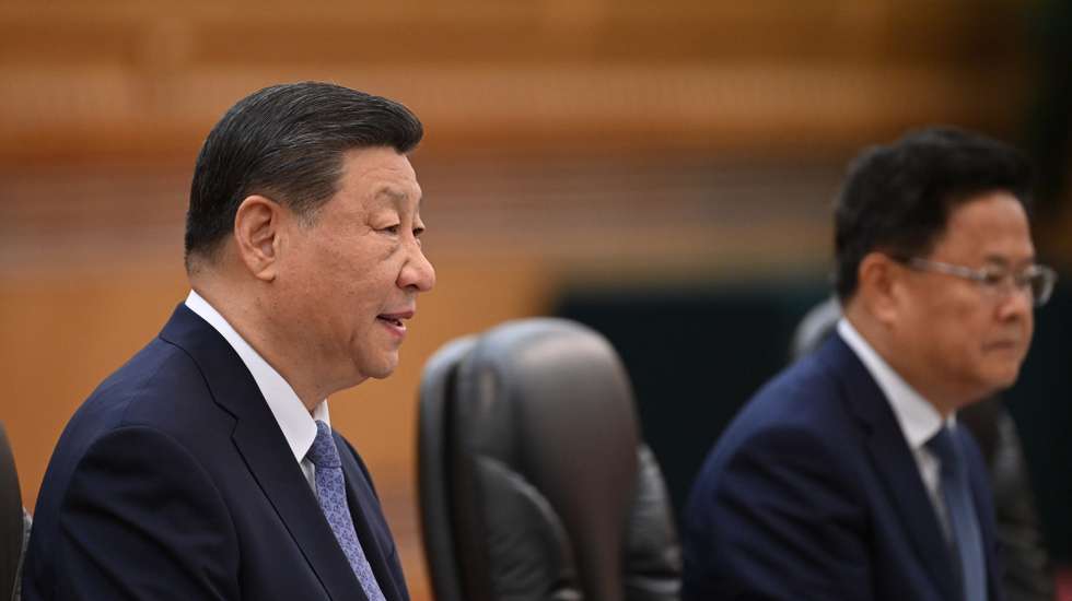 epa11438689 China's President Xi Jinping (L) speaks during a bilateral meeting with Vietnam's Prime Minister Pham Minh Chinh (not pictured) at the Great Hall of the People in Beijing, China, 26 June 2024.  EPA/ADEK BERRY / POOL