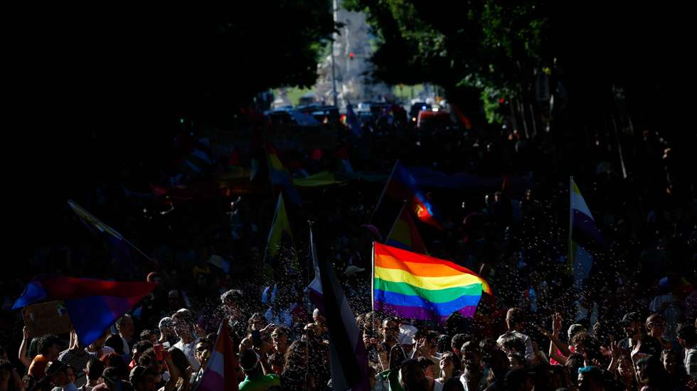 epa11463090 People take part in the 25th Lisbon Pride Parade, in Lisbon, Portugal, 06 July 2024. The Lisbon Pride LGBT parade takes place in the Portuguese capital against the discrimination of people with various sexual orientations.  EPA/ANTONIO PEDRO SANTOS