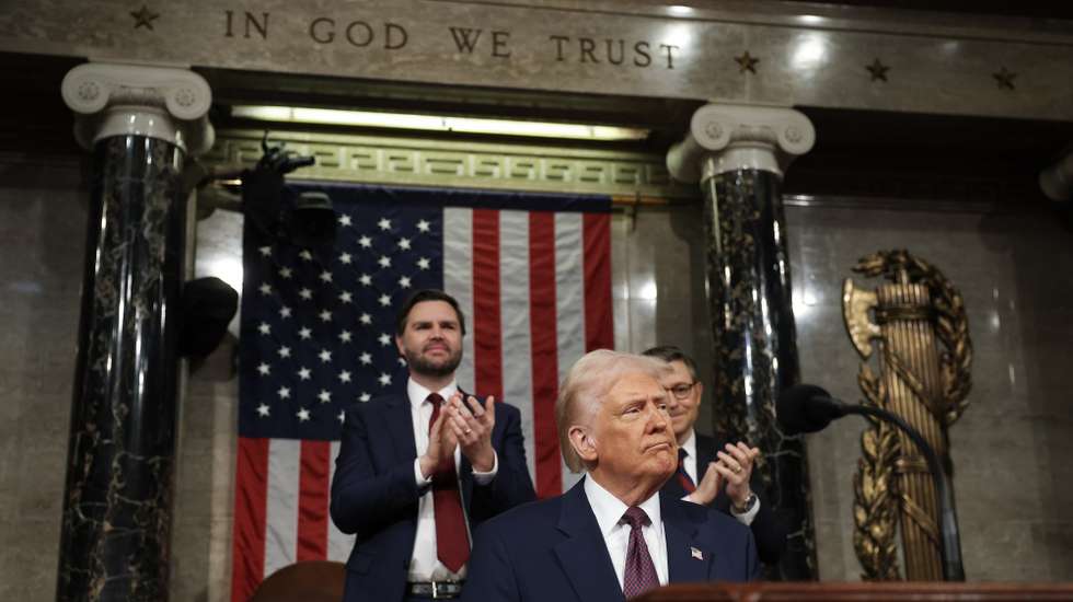 epa11941455 US President Donald Trump (C) addresses a joint session of the United States Congress at the US Capitol in Washington, DC, USA, 04 March 2025. Also pictured are US Vice President JD Vance (L) and US Speaker of the House Mike Johnson.  EPA/WIN MCNAMEE / POOL