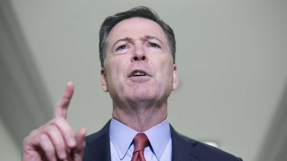 epa07237747 Former FBI Director James Comey delivers remarks to members of the news media after finishing his testimony before members of the House Judiciary and House Oversight and Government Reform Committees, on Capitol Hill in Washington, DC, USA, 18 December 2018. The two House panels are investigating the handling by federal law enforcement of probes into Hillary Clinton's emails and possible ties between Russia and the 2016 Trump presidential campaign.  EPA/MICHAEL REYNOLDS