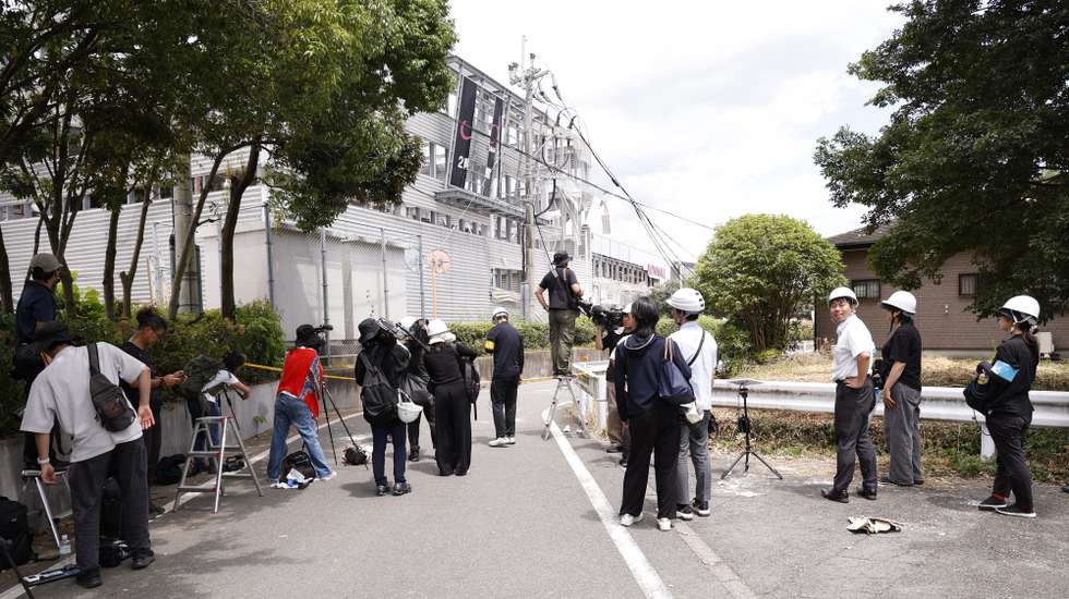 epa13138824 Media members report from the heavily damaged Aeon Mall Kumamoto building in Kashima, Kumamoto Prefecture, southwestern Japan, 29 July 2026. At least 13 people have died and several were injured after a 7.1-magnitude earthquake struck Kumamoto Prefecture, damaging infrastructure including a shopping mall and a factory, according to Japanese Prime Minister Sanae Takaichi.  EPA/RODRIGO REYES MARIN