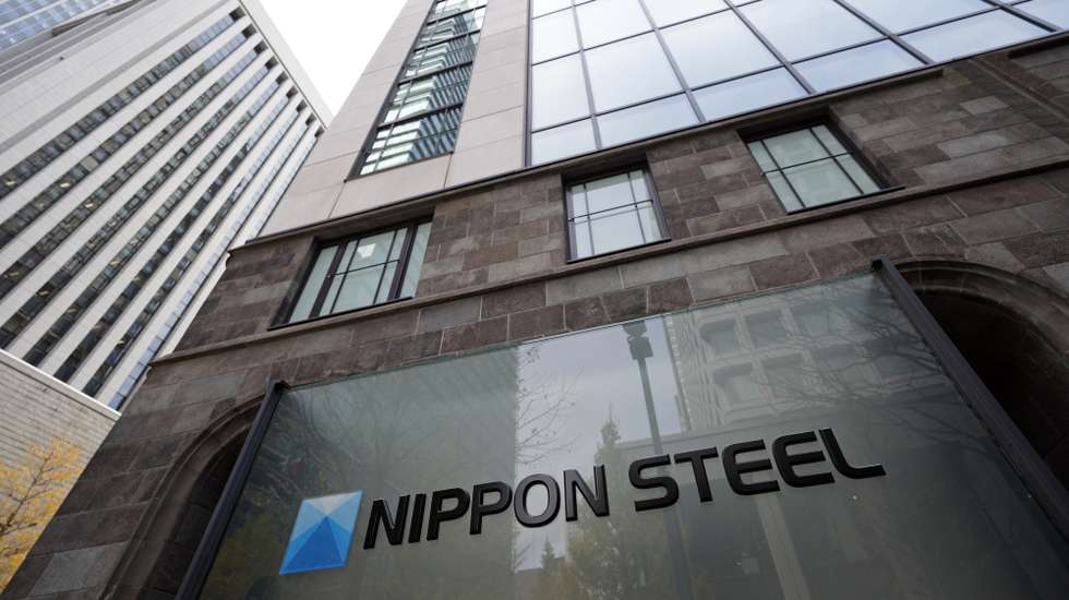 epa11036695 The signage of Nippon Steel Corp. is displayed before the building housing the company's headquarters, in Tokyo, Japan, 19 December 2023. On late 18 December 2023, Nippon Steel Corp. (NSC) announced it decided to acquire United States Steel Corporation for around 14 billion US dollar.  EPA/FRANCK ROBICHON
