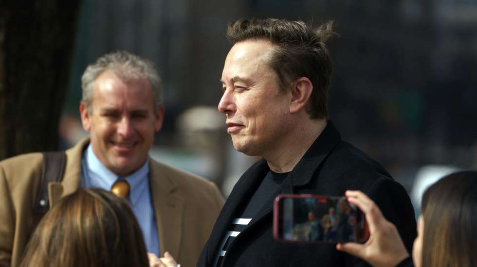 epa11893568 US entrepreneur and US special government employee Elon Musk (R) leaves Blair House close to the White House, in Washington, DC, USA, 13 February 2025.  EPA/WILL OLIVER