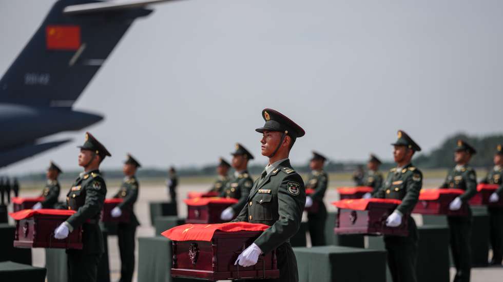 epa12370836 Coffins containing the remains of Chinese People's Volunteers (CPV) soldiers are about to be loaded onto vehicles at Taoxian International Airport in Shenyang, northeast China's Liaoning Province, 12 September 2025. The remains of 30 Chinese People's Volunteers (CPV) soldiers who lost their lives during the War to Resist US Aggression and Aid Korea (1950-1953) were returned to China on 12 September from South Korea.  EPA/XINHUA / PAN YULONG CHINA OUT / UK AND IRELAND OUT  /       MANDATORY CREDIT EDITORIAL USE ONLY