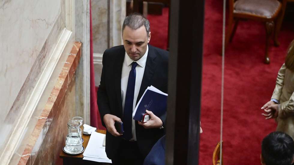 epa12922200 Argentine Chief of Staff Manuel Adorni walks away after presenting a performance report at the Chamber of Deputies in Buenos Aires, Argentina, 29 April 2026.  EPA/MATIAS MARTIN CAMPAYA