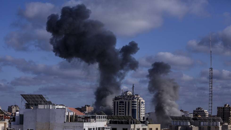 epa09207471 Smoke rise after an Israeli air strike in Gaza City, 17 May 2021. In response to days of violent confrontations between Israeli security forces and Palestinians in Jerusalem, various Palestinian militants factions in Gaza launched rocket attacks since 10 May that killed at least six Israelis to date. Gaza Strip's health ministry said that at least 65 Palestinians, including 13 children, were killed in the recent retaliatory Israeli airstrikes. Hamas confirmed the death of Bassem Issa, its Gaza City commander, during an airstrike.  EPA/HAITHAM IMAD