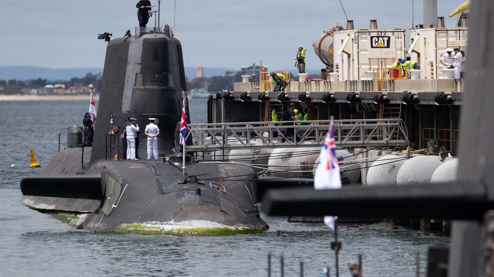 epa09551620 A view of the UK nuclear-powered attack submarine HMS Astute at HMAS Stirling Royal Australian Navy base in Perth, Western Australia, Australia, 29 October 2021. Australia is committed to getting its first nuclear-powered submarines built and operating as quickly as possible, said Defence Minister Peter Dutton. In September 2021, Australia, the United Kingdom (UK) and the United States of America (USA) announced an enhanced trilateral security partnership called AUKUS, under which Australia will acquire a number of nuclear-powered submarines.  EPA/RICHARD WAINWRIGHT AUSTRALIA AND NEW ZEALAND OUT