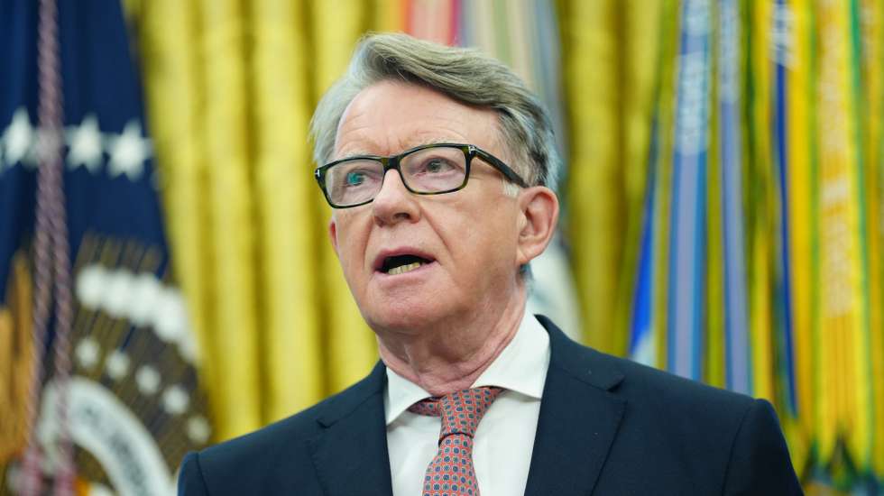 epa12084103 British Ambassador to the United States Peter Mandelson listens as US President Donald Trump (not pictured) announces a trade agreement between the United States and the United Kingdom in the Oval Office of the White House in Washington, DC, USA, 08 May 2025.  EPA/BONNIE CASH / POOL