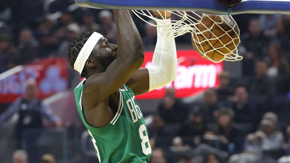 epa12760481 Boston Celtics center Neemias Queta dunks the ball for two points against the Golden State Warriors during the first half of the NBA game between the Boston Celtics and the Golden State Warriors in San Francisco, California, USA, 19 February 2026.  EPA/JOHN G. MABANGLO SHUTTERSTOCK OUT