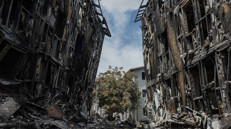 epa13070943 Buildings destroyed by earthquakes are seen in Catia La Mar, Venezuela, 28 June 2026. Venezuelan National Assembly President Jorge Rodriguez said at least 1,430 people were killed after two powerful earthquakes struck the country on 24 June. Authorities have restricted access to some disaster zones and deployed the military as relief efforts continue.  EPA/Henry Chirinos