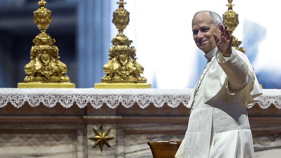 epa13162775 Pope Leo XIV greets faithful as he attends the weekly general audience in Saint Peter's Basilica, in Vatican City, 12 August 2026.  EPA/ANGELO CARCONI
