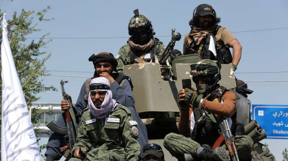 epa13171454 Taliban government security officials secure a rally as part of celebrations to mark the fifth anniversary of the Taliban takeover of Afghanistan, in Kabul, Afghanistan, 15 August 2026. Afghanistan marks five years since the Taliban returned to power and entered Kabul on 15 August 2021, following the collapse of the former government and withdrawal of US-led forces.  EPA/SAMIULLAH POPAL