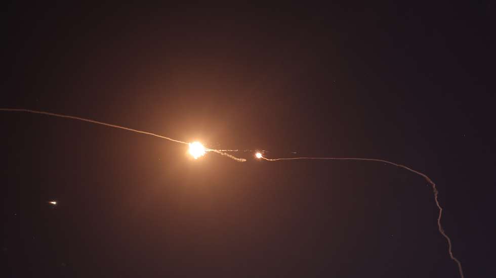 epa12176281 Israel's Iron Dome air defense system intercepts ballistic missiles fired from Iran over the city of Tel Aviv, Israel, 15 June 2025. Israel's military identified the missiles as being launched from Iran toward Israeli territory in retaliation for overnight airstrikes on Iranian targets.  EPA/ATEF SAFADI