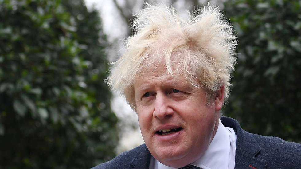 epa10534790 Former British Prime Minister Boris Johnson outside his home in London, Britain, 21 March 2023. Johnson is set to give evidence to MPs who are investigating accusations that he misled Parliament over Partygate, on 22 March.  EPA/ANDY RAIN