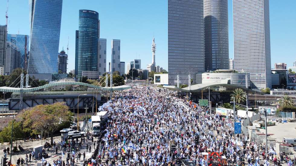 epaselect epa10511206 A picture taken with a drone shows  protesters during a rally against the government justice system reform plan in Tel Aviv, Israel 09 March 2023. The protest leaders announced a national day of resistance with demonstrations and roadblocks all over the country against the controversial judicial reform plans to weaken the authority of the supreme court, proposed by the government of Prime Minister Benjamin Netanyahu.  EPA/ABIR SULTAN