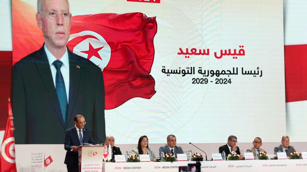 epa11648050 Farouk Bouasker (L), president of the High Independent Authority for Elections (ISIE), gives a press conference to announce the results of the presidential election in Tunis, Tunisia, 07 October 2024. Bouasker announced that 2,808,548 voters went to the polls on 06 October for a turnout of 28.8%. Incumbent President Kais Saied came in first place with a score of 90.69%, or 2,438,954 of the votes. He is followed by Ayachi Zammel with a rate of 7.35% (197,551) then Zouhaier Maghzaoui with a rate of 1.97% (52,935 votes).  EPA/MOHAMED MESSARA