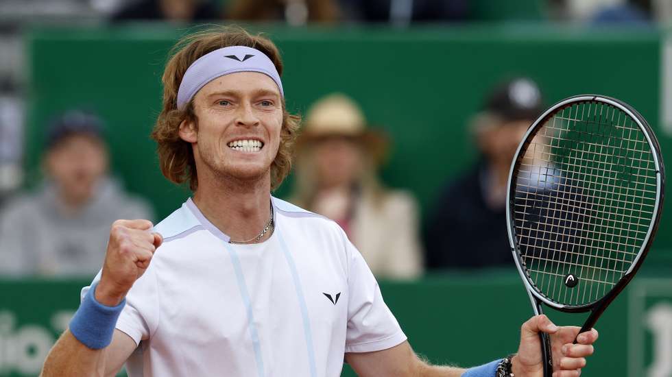 epa10574051 Andrey Rublev of Russia celebrates winning against Taylor Fritz of the US during their semi final match at the Monte-Carlo Rolex Masters tournament in Roquebrune Cap Martin, France, 15 April 2023.  EPA/SEBASTIEN NOGIER