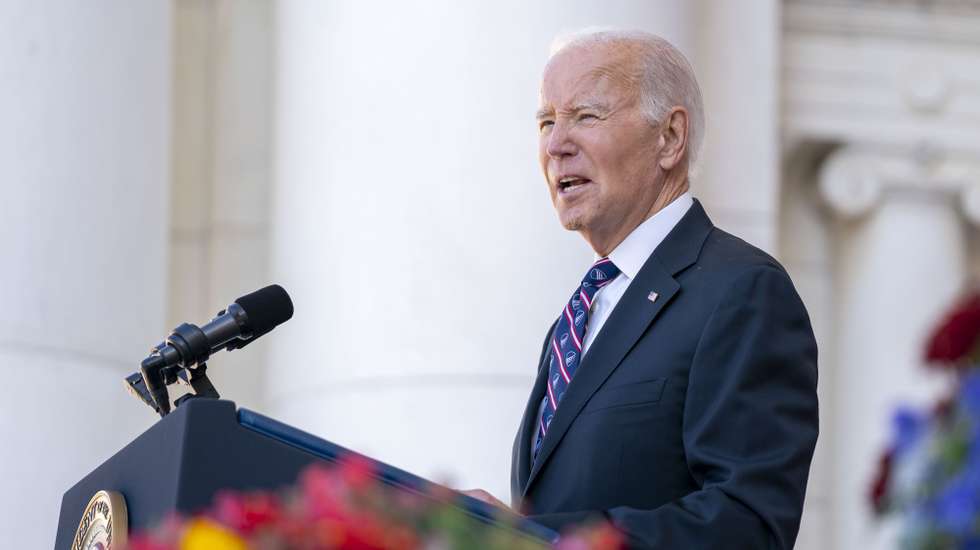 epa10970688 US President Joe Biden delivers remarks at the Memorial Amphitheater as part of a National Veterans Day Observance at the Arlington National Cemetery in Arlington, Virginia, USA, 11 November 2023. The Veterans Day National Ceremony is held annually on 11 November at Arlington National Cemetery.  EPA/BONNIE CASH / POOL