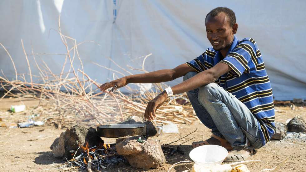 epa08858046 An Ethiopian refugee from Tigray region at the Um Rakuba refugee camp, the same camp that hosted Ethiopian refugees during the famine in the 1980s, some 80 kilometres from the Ethiopian-Sudan border in Sudan, 30 November 2020 (issued 02 December 2020). According to World Food Programme on 02 December, about 12,000 Ethiopian refugees from Tigray are accommodated in the Um Rakuba camp as over 40,000 Ethiopian refugees fled to Sudan since the start of fights in the northern Tigray region of Ethiopia. Ethiopia's military intervention   comes after Tigray People's Liberation Front (TPLF) forces allegedly attacked an army base on 03 November 2020 sparking weeks of unrest. According to reports on 02 December 2020, UN reached an agreement with Ethiopian government to provide aid for the Tigray region of Ethiopia.  EPA/ALA KHEIR