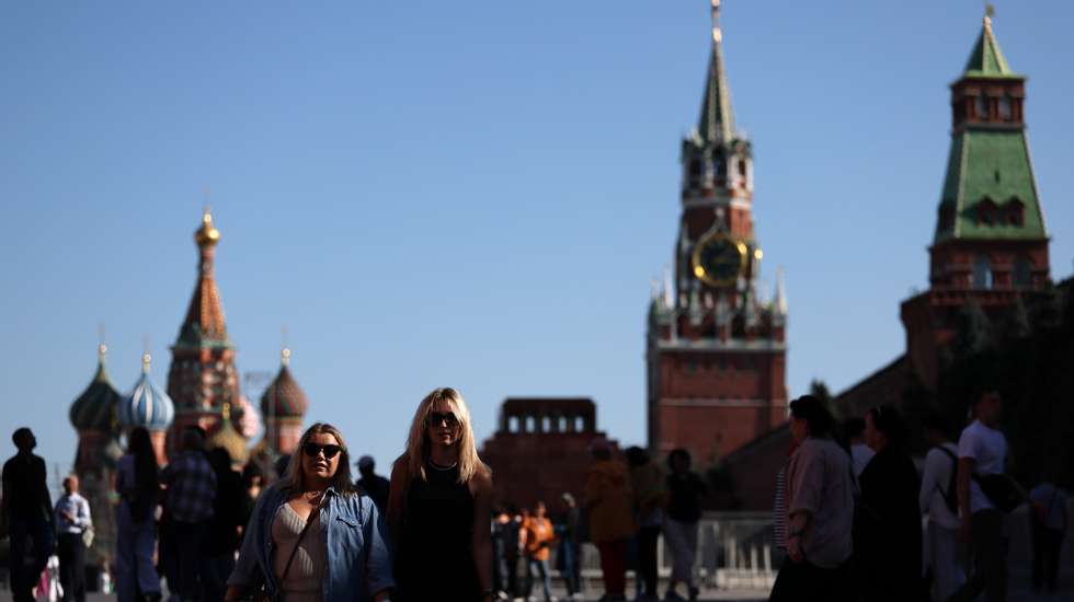 epa11587329 People walk on the Red Square outside the Kremlin in downtown Moscow, Russia, 05 September 2024.  EPA/MAXIM SHIPENKOV