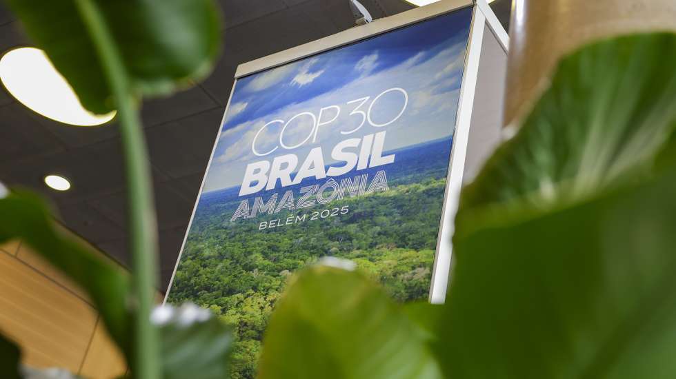 epa12178879 A sign is displayed at the Brazilian exhibition stand during the Climate Change Conference in Bonn, Germany, 16 June 2025. The SB62 Climate Change Conference is the pre-sessional meeting for the COP30 Climate Change Conference to be held in Belem, Brazil in November 2025.  EPA/CHRISTOPHER NEUNDORF