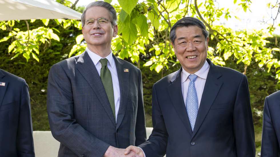 epa12098565 US Secretary of the Treasury Scott Bessent (L) and Chinese Vice Premier He Lifeng (R) shake hands during the second day of a bilateral meeting in Geneva, Switzerland, 11 May 2025 (made available on 14 May 2025).  EPA/MARTIAL TREZZINI / POOL PHOTO MADE AVAILABLE MAY 14, 2025;