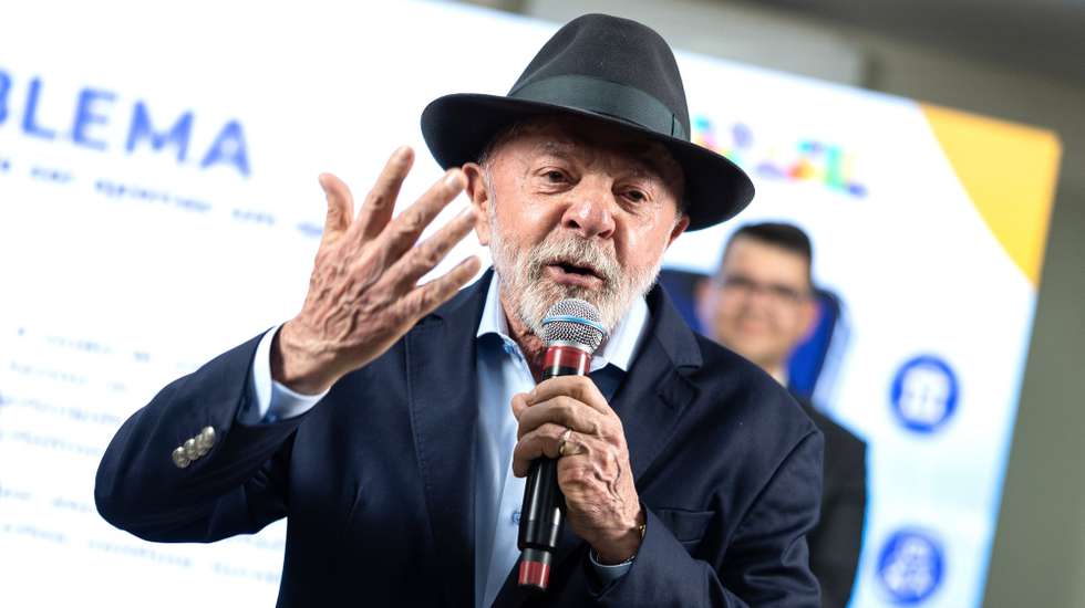 epa13059377 Brazilian President Luiz Inacio Lula da Silva speaks during the launch of a new phase of the National Safe Cell Phone Program at Guarulhos Air Base in Guarulhos, Brazil, 23 June 2026. Lula da Silva signed a decree allowing authorities to restrict stolen, robbed or lost cell phones, a measure aimed at curbing a crime with nearly one million reports per year, according to officials.  EPA/ISAAC FONTANA
