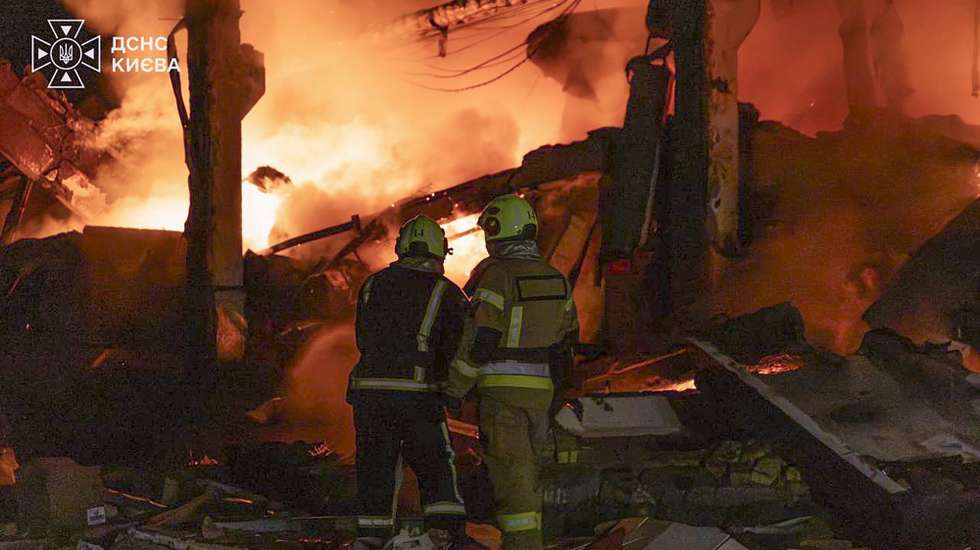 epa13161264 A handout photo made available by the State Emergency Service shows Ukrainian rescuers working at the site of a Russian ballistic missile strike on a residential area in Kyiv, Ukraine, 11 August 2026, amid the ongoing Russian invasion.  EPA/STATE EMERGENCY SERVICE / HANDOUT  HANDOUT EDITORIAL USE ONLY/NO SALES
