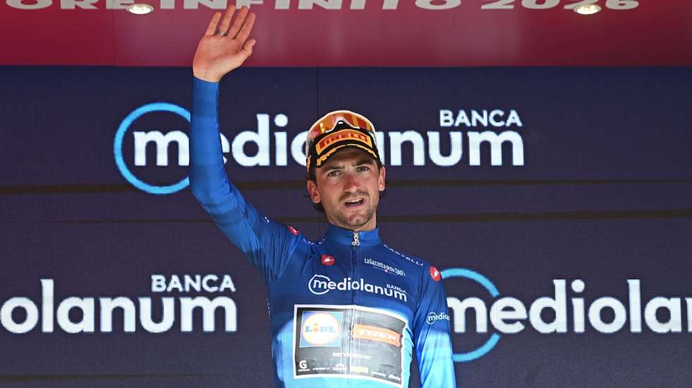epa13002926 Italian cyclist Giulio Ciccone of Lidl Trek team wearing the best climber's blue jersey poses on the podium after the 19th stage of the 109 Giro d'Italia 2026, over 151 km from Feltre to Alleghe, Italy, 29 May 2026.  EPA/LUCA ZENNARO