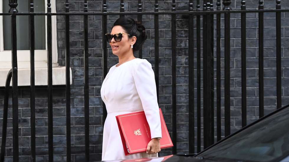 epa10079335 Britain's Home Secretary Priti Patel arrives at a cabinet meeting at Downing Street in London, Britain, 19 July 2022. Britain's Prime Minister Boris Johnson announced his resignation on 07 July 2022 and will remain as Prime Minister until a leader is elected.  EPA/NEIL HALL