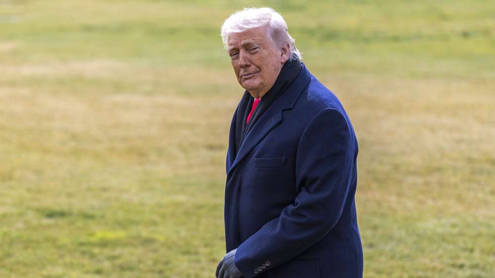 epa12654051 US President Donald J. Trump responds to questions from the news media as he walks to board Marine One on the South Lawn of the White House in Washington, DC, USA, 16 January 2026. President Trump is traveling to Florida for the weekend.  EPA/SHAWN THEW