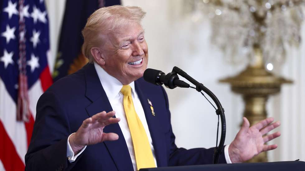 epa12755694 US President Donald Trump speaks at a reception for Black History Month in the East Room of the White House in Washington, DC, USA, 18 February 2026. The event occurs less than two weeks after the president's Truth Social account shared a video depicting former President Barack Obama and former First Lady Michelle Obama as apes, a post the White House later attributed to a staffer after it was denounced as racist.  EPA/JIM LO SCALZO / POOL