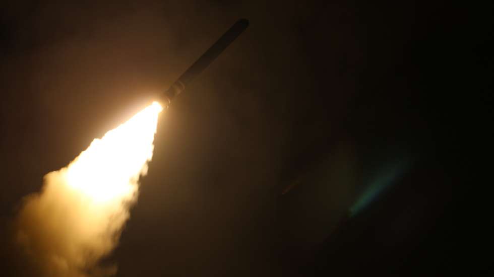 epa06668824 Image dated 14 April 2018 provided by the US Navy showing the guided-missile cruiser USS Monterey (CG 61) fires a Tomahawk land attack missile. Monterey is deployed to the U.S. 5th Fleet area of operations in support of maritime security operations to reassure allies and partners and preserve the freedom of navigation and the free flow of commerce in the region.  EPA/Matthew Daniels  HANDOUT EDITORIAL USE ONLY/NO SALES