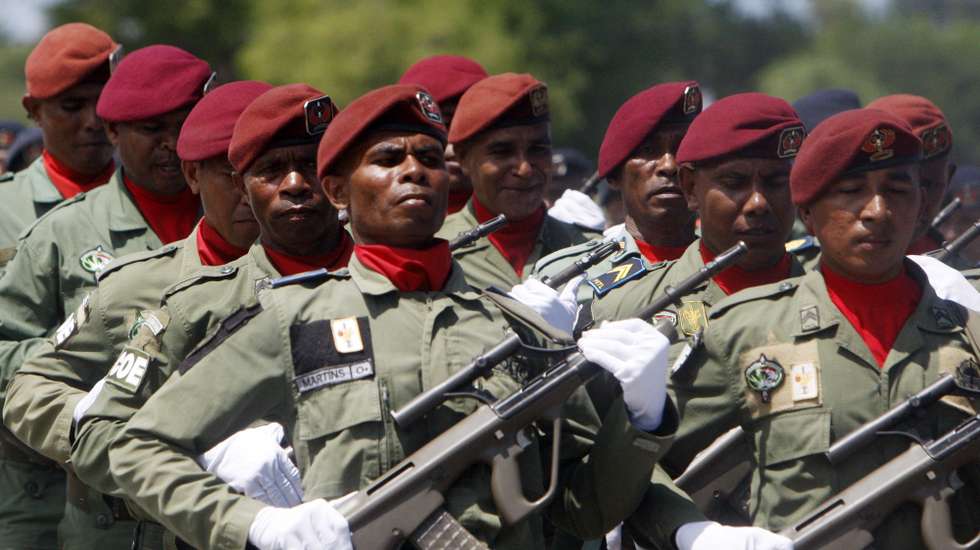 epa08847437 East Timorese soldiers march during a ceremony to mark 45th anniversary of Independence Restoration Day in Liquica, East Timor, 28 November 2020. The country gained their independence from Indonesia in 2002.  EPA/ANTONIO DASIPARU