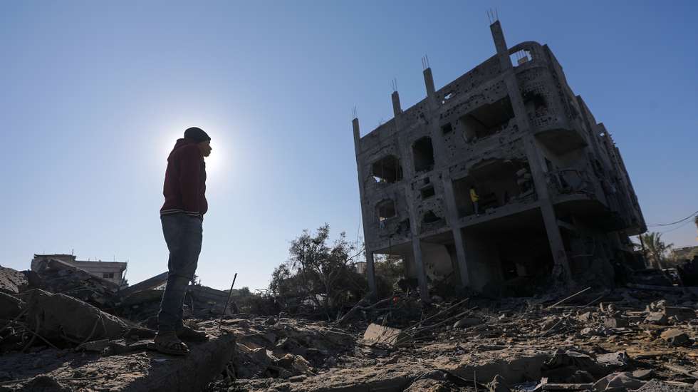 epa11803383 Palestinians inspect the destroyed house of the Abu Libda family following an Israeli air strike in Al Maghazi refugee camp, central Gaza Strip, 03 January 2025. According to reports from the Ministry of Health in Gaza at least nine members of the Abu Libda family were killed following an Israeli air strike in the refugee camp. More than 45,500 Palestinians and over 1,400 Israelis have been killed, according to the Palestinian Health Ministry and the Israeli Army, since Hamas militants launched an attack against Israel from the Gaza Strip on 07 October 2023 and the Israeli operations in Gaza and the West Bank that followed it.  EPA/MOHAMMED SABER