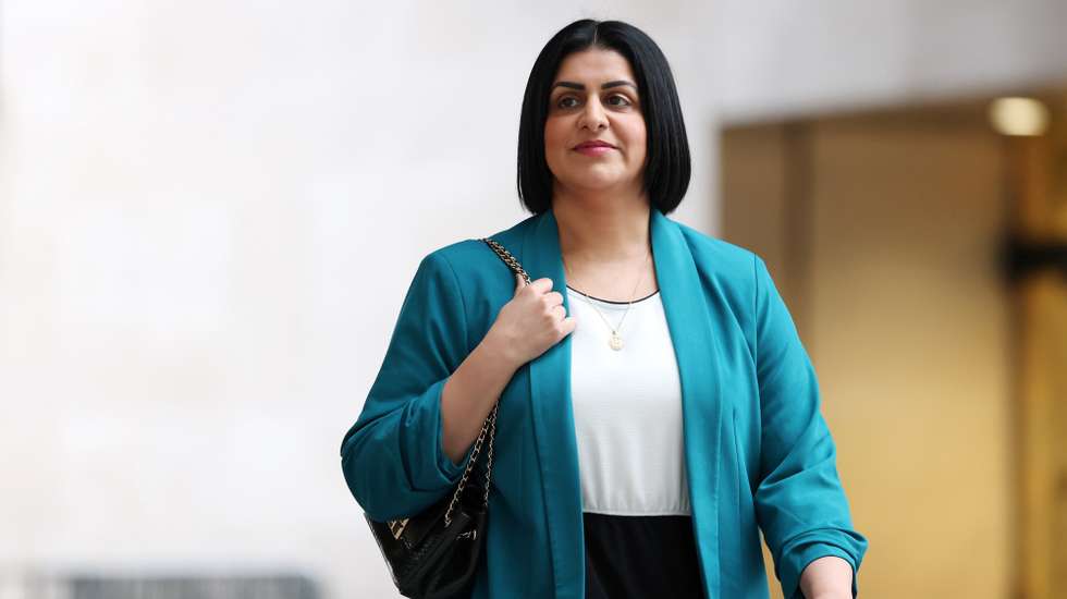 epa12528761 British Home Secretary Shabana Mahmood arrives at the BBC in London, Britain, 16 November 2025. Mahmood is expected to announce changes to Britain's asylum system in a statement to Parliament on 17 November, under which refugees will no longer be granted permanent stay in the UK.  EPA/ANDY RAIN