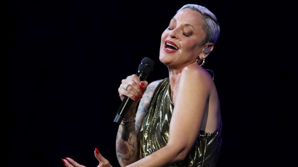 epa11466084 Portuguese singer Mariza performs during her 'Fado Night' concert as part of Granada's Music and Dance International Festival at Generalife Theatre in Granada, Spain, 07 July 2024.  EPA/PEPE TORRES