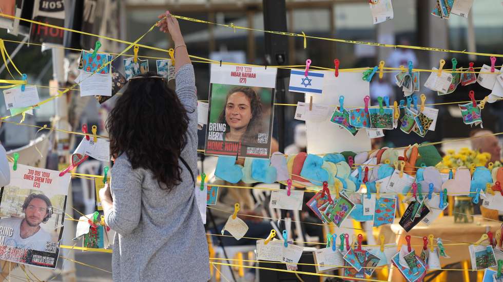 epa11760225 People organis  tributes to Israeli hostages held by Hamas in Gaza in ‘the hostages square’ outside the Kirya military base, in Tel Aviv, Israel, 06 December 2024. According to the Israeli army (IDF), around 100 Israeli hostages remain in captivity in the Gaza Strip, including bodies of 33 confirmed dead.  EPA/ABIR SULTAN