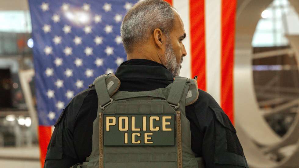epa12844849 A US Immigration and Customs Enforcement (ICE) agent patrols the John F. Kennedy International Airport, amid congestion caused by the Department of Homeland Security (DHS) shutdown, in the Queens borough of New York, New York, USA, 23 March 2026. ICE agents have begun deploying to major US airports to assist the Transportation Security Administration (TSA) as a partial government shutdown triggers widespread security checkpoint delays. With the Department of Homeland Security (DHS) facing a funding lapse, TSA screeners and thousands of other federal employees are currently working without pay.  EPA/OLGA FEDOROVA