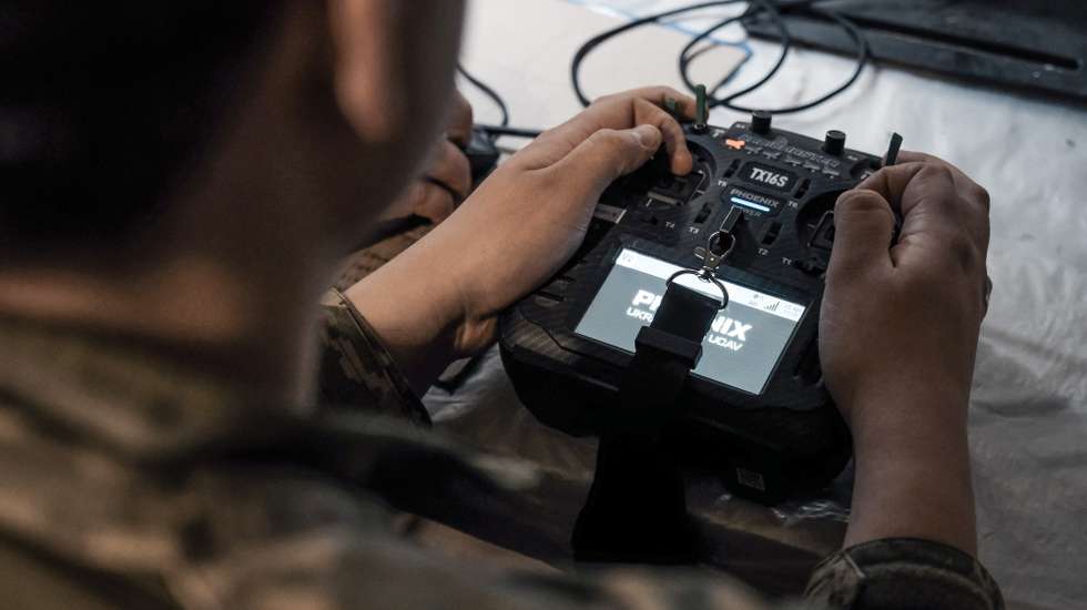 epa12844618 A Ukrainian pilot of the 93rd Brigade 'Kholodny Yar' operates an interceptor drone from his combat position, where he works bringing down Russian drones, at an undisclosed location near the frontline in the Druzhkivka area (Donetsk), Ukraine, 23 March 2026. The Ukrainian Army employs FPV (First Person View) interceptor drones to bring down other slower and more expensive unmanned vehicles that Russia's forces use for reconnaissance missions or to attack inside the cities located at the frontline.  EPA/Maria Senovilla