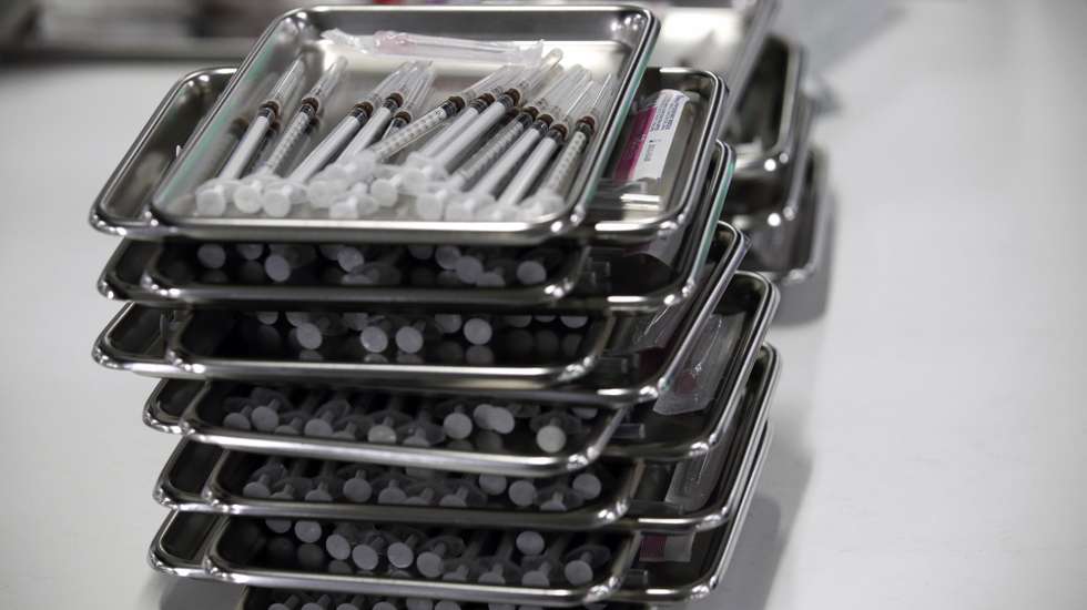 epa09565465 Syringes with doses of AstraZeneca COVID-19 vaccine are prepared at Bang Sue Central Vaccination Center in Bangkok, Thailand, 05 November 2021. Thailand rolled out a mix and match cross-vaccine formula vaccination initiative drive using AstraZeneca and Pfizer-BioNTech to combat the COVID-19 coronavirus pandemic which believed the first jab of AstraZeneca viral vector vaccine following the second dose of Pfizer mRNA vaccine to be more effective against the Delta variant strain. The Thai government sped up the second and third booster shots of COVID-19 vaccines to people after the easing of curbs and reopened the country for foreign tourists as part of its living with COVID strategy.  EPA/RUNGROJ YONGRIT