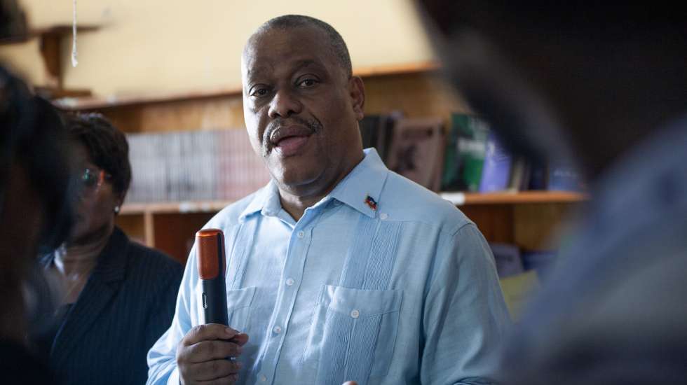 epa11636887 Haitian Prime Minister Garry Conille speaks to the media during a visit to the Jeunes Filles high school, during the start of the school year, in Port-au-Prince, Haiti, 01 October 2024. The school year began in Haiti on 01 October, but it did so in an uneven manner, with some schools closed and others turned into camps for displaced people amid violence, especially in Port-au-Prince, and with no special measures in place to guarantee the safety of students.  EPA/Mentor David Lorens