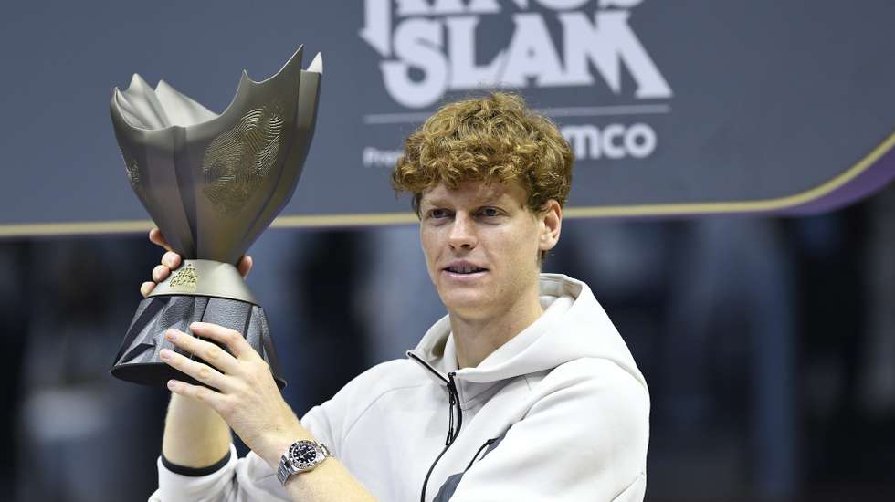 epa11669650 Jannik Sinner of Italy holds his trophy after winning his final match against Carlos Alcaraz of Spain at the Six Kings Slam exhibition tennis tournament in Riyadh, Saudi Arabia, 19 October 2024.  EPA/STR