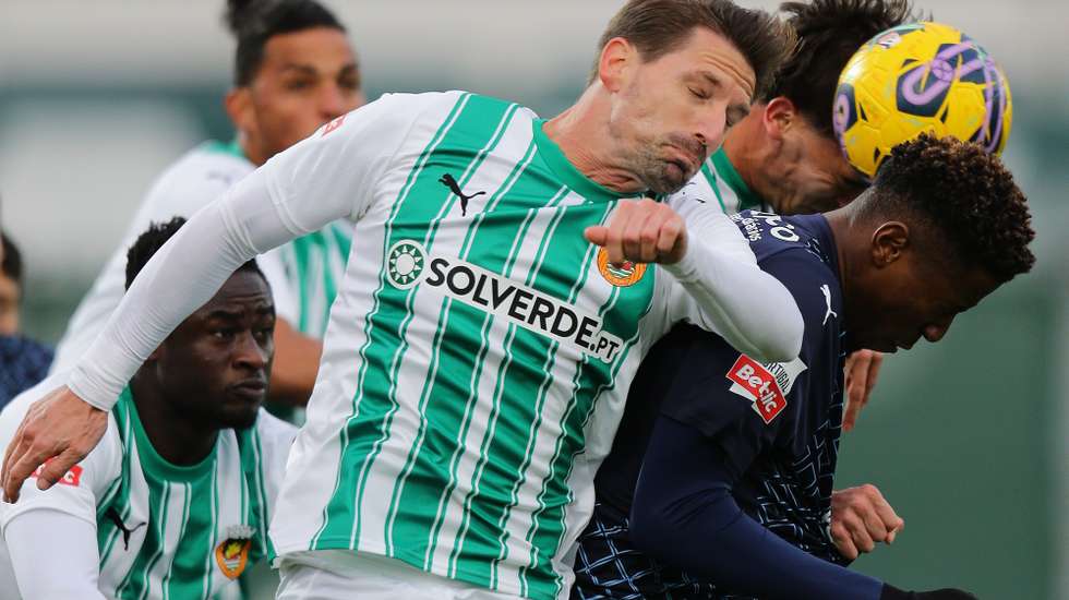 Rio Ave FC Adrien Silva (C) in action against SC Braga Simon Banza (R) during the Portuguese First League soccer match between Rio Ave FC and SC Braga at Arcos Stadium in Vila do Conde, Portugal, 09 March 2024. MANUEL FERNANDO ARAUJO/LUSA