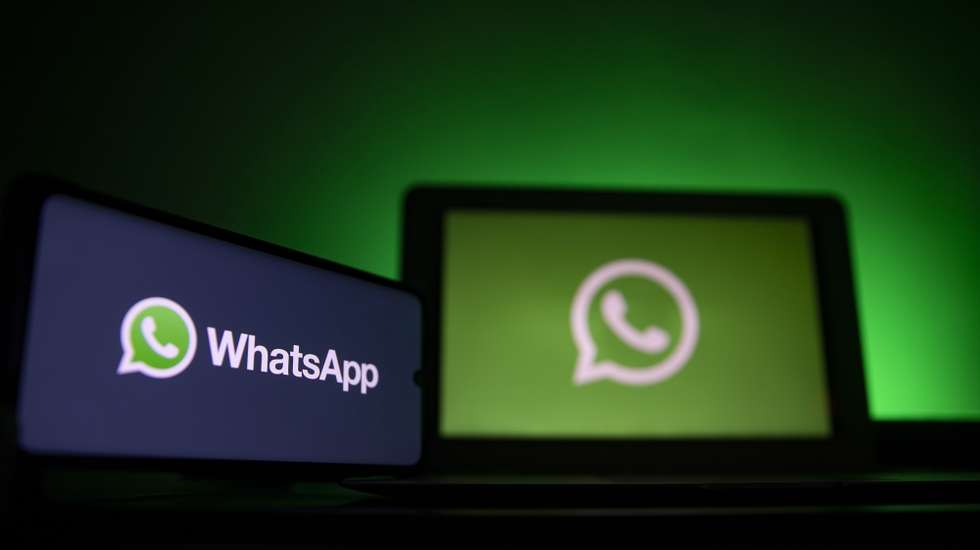 epa08967946 A photo illustration shows the logo of social media messaging application Whatsapp on a computer and a mobile telephone screen, in Paris, France, 27 January 2021. The popular application (app) Whatsapp has faced backlash after announcing on 04 January a change to its privacy policy under which users widely interpreted that personal information would be shared with the app's parent company, Facebook. Although the policy change allegedly was only to affect interactions with business accounts, it prompted millions of users to migrate to rival messaging applications such as Signal and Telegram.  EPA/IAN LANGSDON