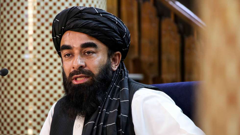 epa09451153 Zabihullah Mujahid, Taliban spokesperson talks with journalists during a press conference in Kabul, Afghanistan, 06 September 2021. The Taliban on 06 September, claimed that their Afghan takeover was complete after they captured Panjshir, the last province held by resistance forces opposed to the Islamist militia. Panjshir was also the center of resistance against the Islamist group during the previous Taliban regime from 1996 to 2001.  EPA/STRINGER
