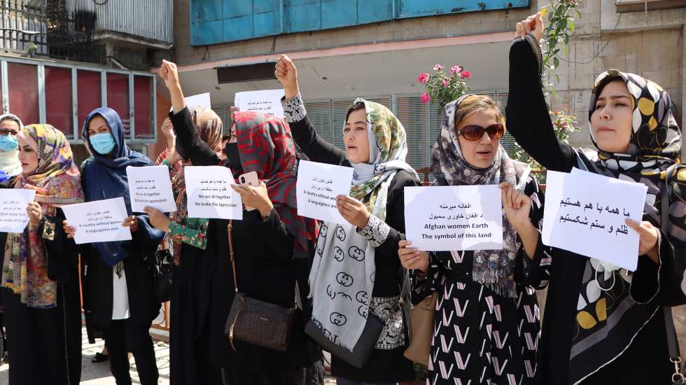 epa09444873 Afghan women hold placards as they demand Taliban to protect their rights in Kabul, Afghanistan, 03 September 2021. The Taliban on 02 September, said they have completed the consultation on government formation but were yet to decide who would head the new Afghan administration that they would announce very soon. The last group of American soldiers departed Kabul around midnight on Monday, ending the longest of US wars that began after the Sep.11, 2001 attacks in America.  EPA/STRINGER