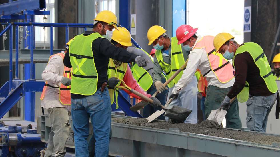 epa09605423 Workers at the China Communications Construction Company (CCCC)-run construction yard in the town of El Triunfo, municipality of Balancan, in Tabasco, Mexico 25 November 2021 (issued 26 November 2021). The Maya Train project, one of the flagship works of the Government of Mexican President Andres Manuel Lopez Obrador, has been delayed by at least five months due to bureaucracy and geological faults, as revealed on 26 November by the general director of the National Fund for the Promotion of Tourism (Fonatur), Rogelio Jimenez. CCCC and Mota-Engil won the Mayan Train contract.  EPA/Manuel Lopez