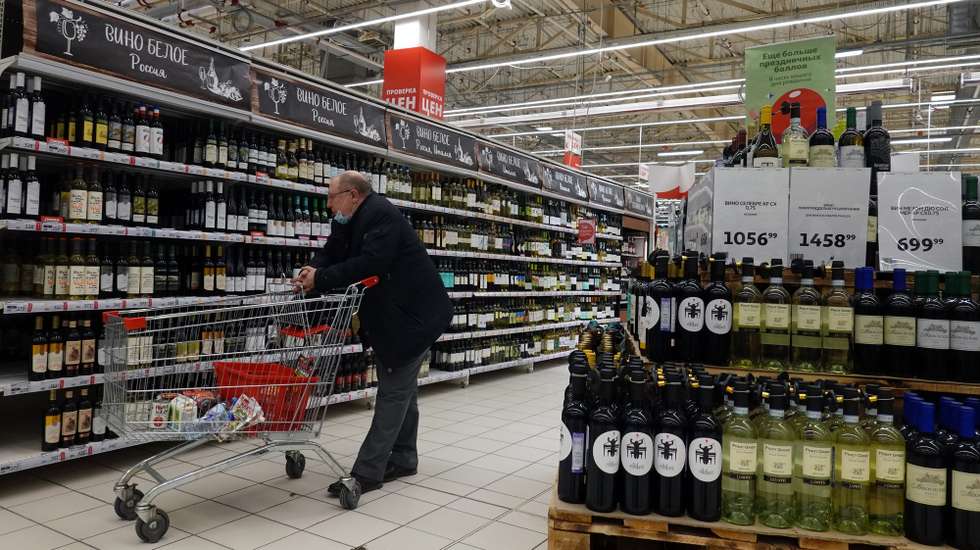 epa09842172 people do shopping at a French supermarket chain Auchan store in Moscow, Russia, 22 March 2022. On 24 February Russian troops had entered Ukrainian territory in what the Russian president declared a 'special military operation', resulting in fighting and destruction in the country, a huge flow of refugees, and multiple sanctions against Russia. As the result of sanctions imposed by the West on Russia, a number of brands such as McDonald's, Ikea, Louis Vuitton, Chanel, Prada, Gucci, Dior, Apple, Master Card Visa and others, have announced the suspension or limitation of their business in Russia.  EPA/MAXIM SHIPENKOV